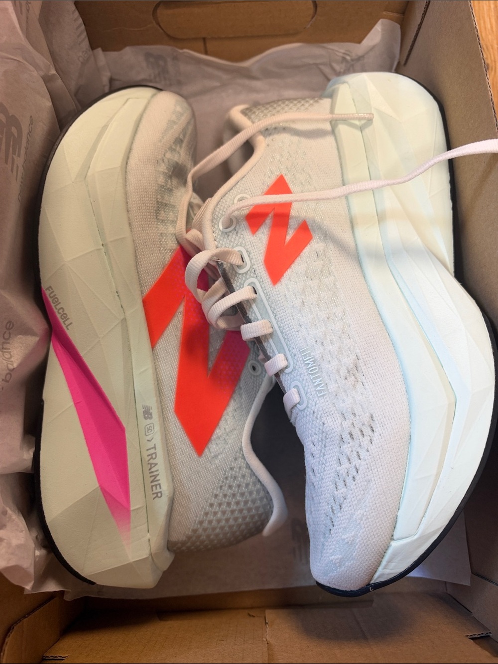 New Balance Women's White Trainers with Pink and Coral Accents